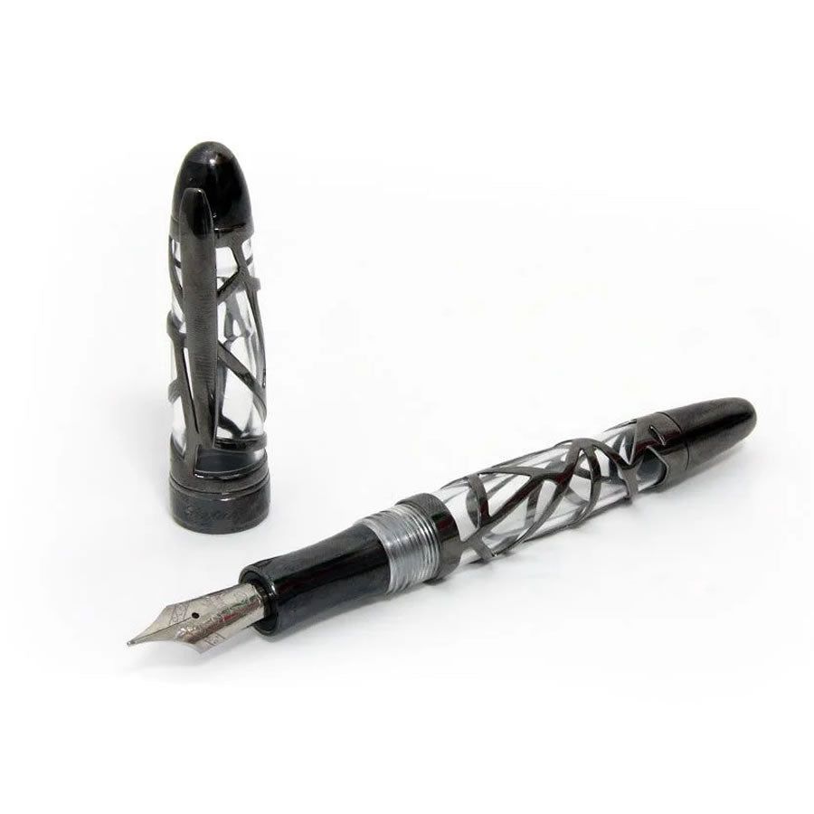 A fountain pen which is transparent but with a metal cage around it in an irregular shattered pattern