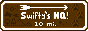 wooden sign, text Swifty's HQ! 10 mi.