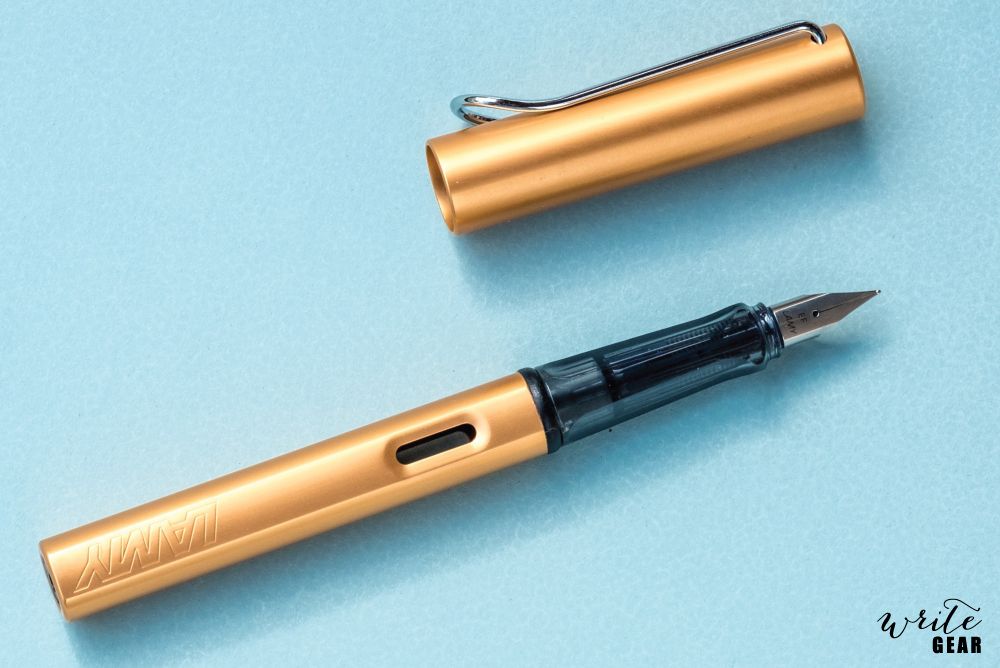 A bronze-coloured and squarish metal fountain pen